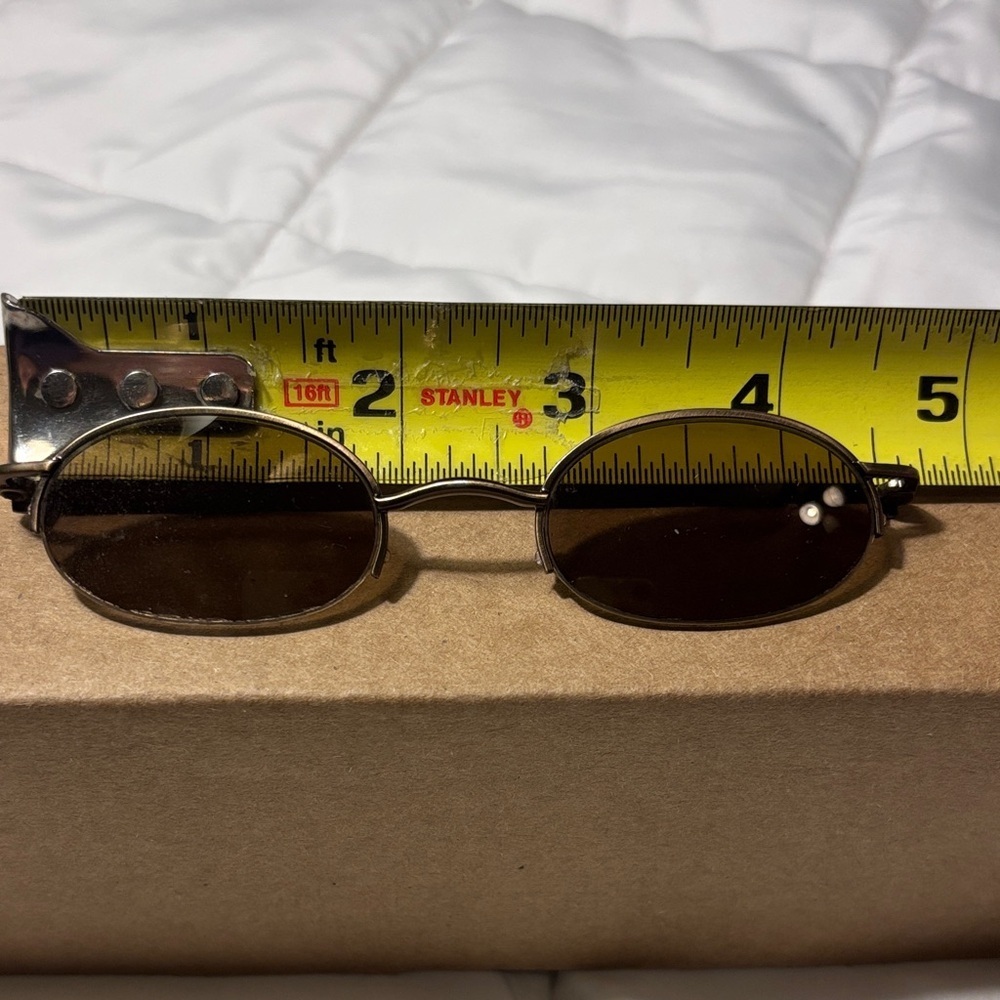 Vintage Nino Balli Gold Half Rim
Oval Eyeglasses with Sunglasses Clips - Picture 9 of 10